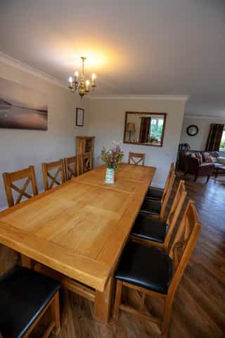 The open-plan living and dining space at Castle View Lodge
