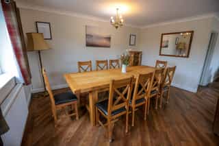 The open-plan living and dining space at Castle View Lodge