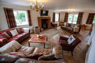 The open-plan living and dining space at Castle View Lodge