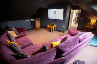 The home cinema room at Castle View Lodge
