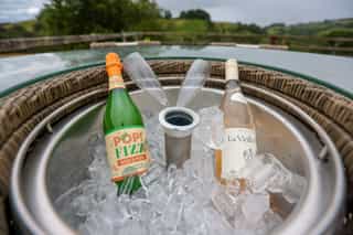 A fizz-on-ice welcome with a countryside view at Castle View Lodge