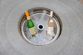 A fizz-on-ice welcome with a countryside view at Castle View Lodge