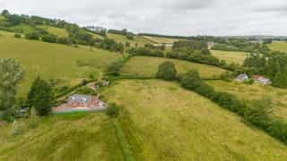 Aerial view of Castle View Lodge and the surrounding hills