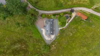 Aerial view of Castle View Lodge and the surrounding hills