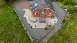 Aerial view of Castle View Lodge and the surrounding hills