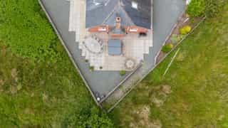 Aerial view of Castle View Lodge and the surrounding hills