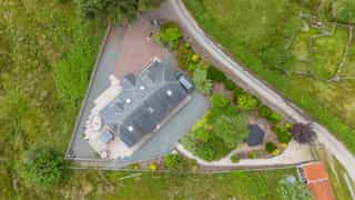 Aerial view of Castle View Lodge and the surrounding hills