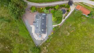 Aerial view of Castle View Lodge and the surrounding hills