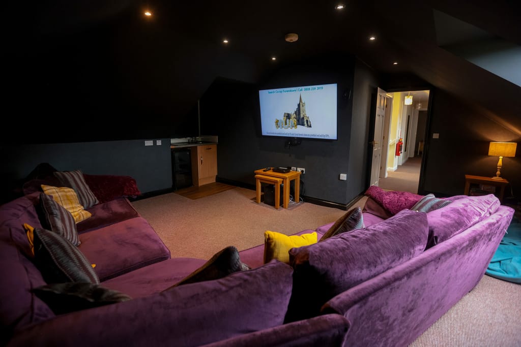 The cinema room at Castle View Lodge
